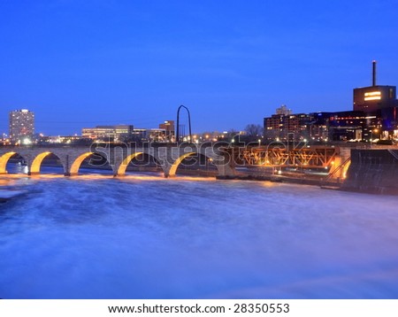 Stone Arch bridge over Mississippi river in downtown Minneapolis
