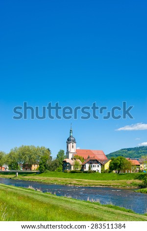View over the river Murg on the parish church Saint Laurentius in Bad Rotenfels, Black Forest, Baden-Wurttemberg, Germany, Europe