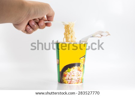 Instant noodles on white background Royalty-Free Stock Photo #283527770