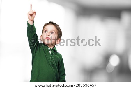little kid pointing up