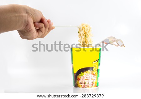 Instant noodles on white background Royalty-Free Stock Photo #283729379