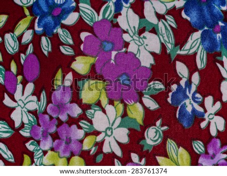 Flower print fabric close up background.