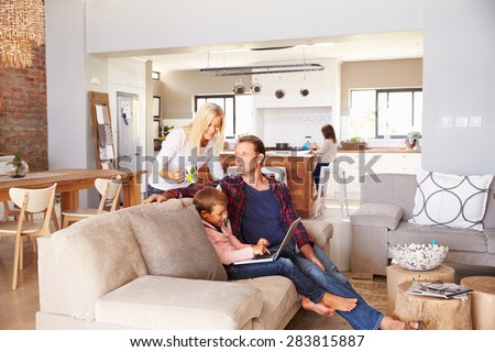 Family spending time together at home Royalty-Free Stock Photo #283815887