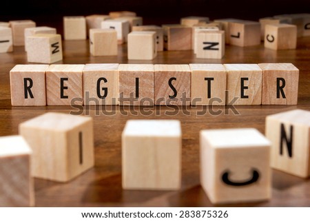 REGISTER word written on wood block