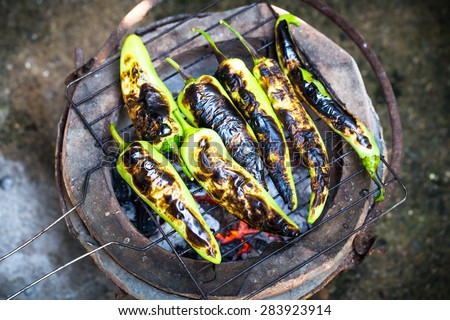 Pepper grilled over charcoal