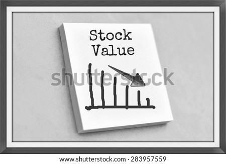 Text stock value on the graph goes down on the short note texture background