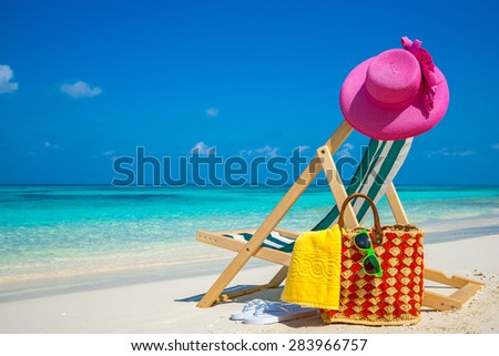 Picture of sunglasses on the tropical beach, vacation. Traveler dreams concept