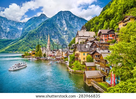Scenic picture-postcard view of famous Hallstatt mountain village with Hallstaetter Lake in the Austrian Alps, region of Salzkammergut, Austria