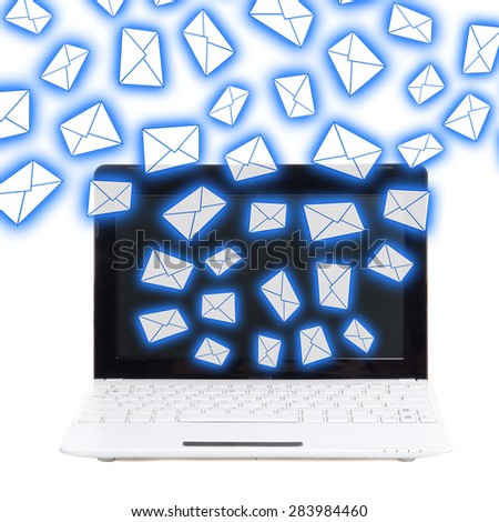 spam concept - laptop with flying envelopes isolated on white background