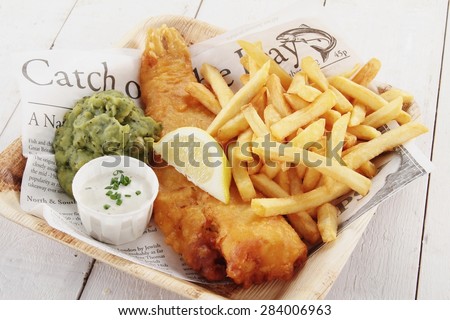 traditional British fish and chips Royalty-Free Stock Photo #284006963