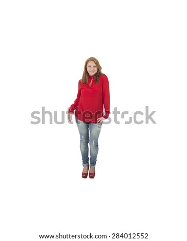 Beautiful woman in red posing against a white background