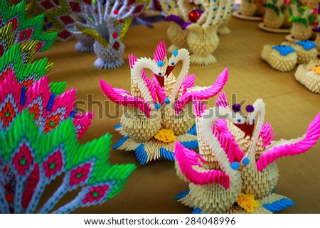 swans folded colorful paper