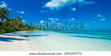 beautiful beach and tropical sea Royalty-Free Stock Photo #284109371