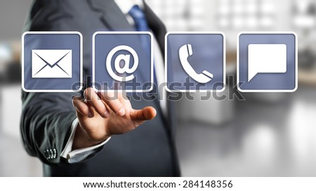 businessman selecting email as a contact option