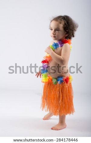 child dressed as a Hawaiian