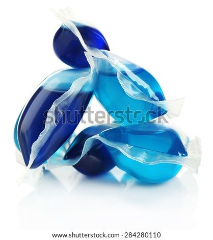 Gel capsules with laundry detergent isolated on white