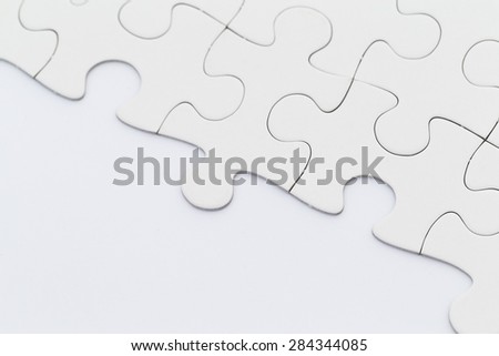 White incomplete jigsaw puzzle