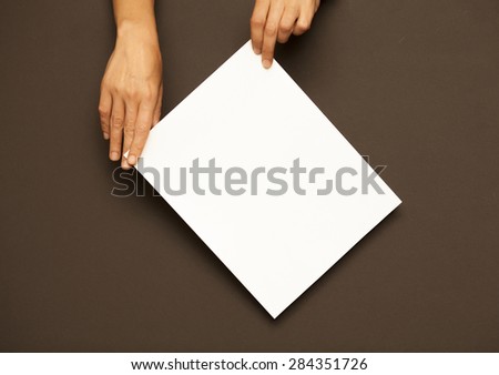 Hands with paper