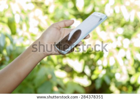 blurry Smart phone in jean pocket
