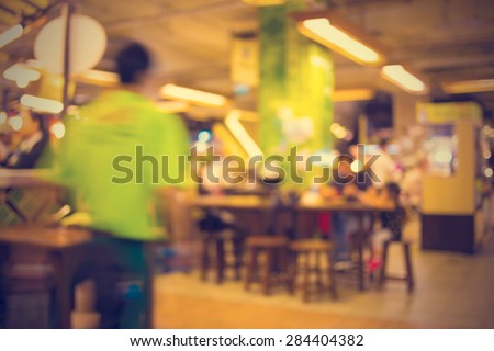 Customer at restaurant blur background with bokeh - vintage effect style pictures.
