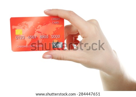 Hand holding credit card, isolated on white