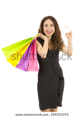 Shopping woman showing a blank sign card