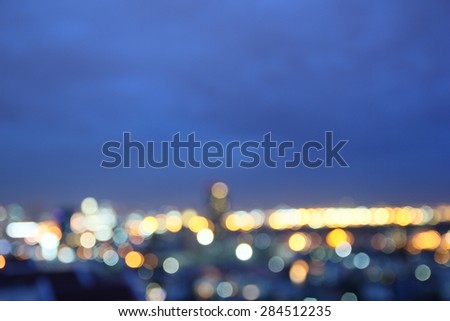 Blur image of Bangkok city with circle bokeh, lights