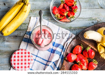 strawberry-banana ice cream in a glass fruit dessert, summer, clean eating,top view Royalty-Free Stock Photo #284515310