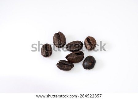 roasted coffee beans with white background