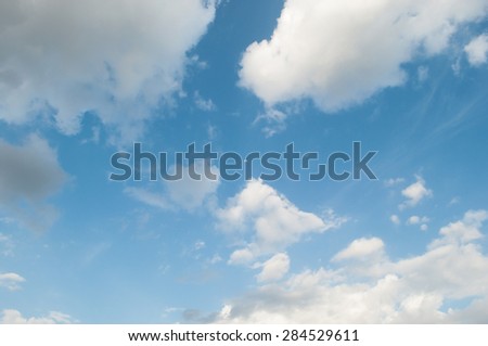 Sky with clouds and little moon