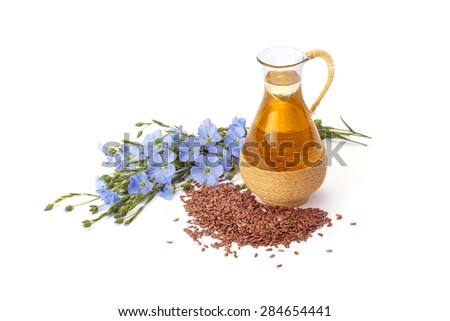 linseed oil, flaxseed and flowers isolated on a white background