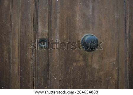 An Old door, with lock and door handle