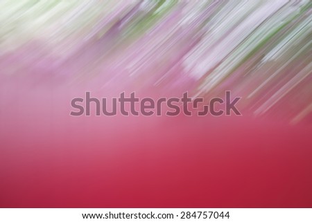 Abstract pattern with the effect of blur of pink and green colors