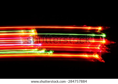 Blurry light effect from small size of multicolor lightbulb on dark background represent the abstract concept related idea.