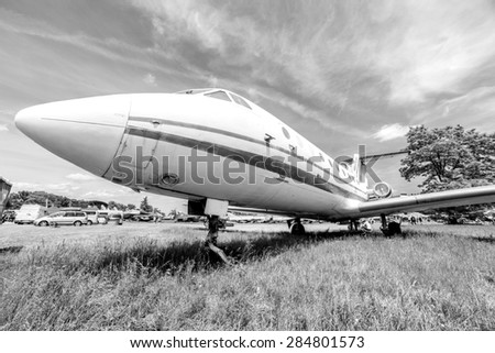A black and white photo of an old plane