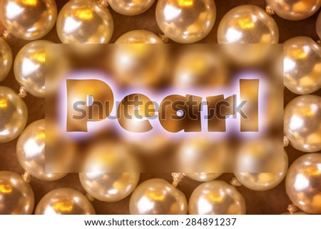 Heap of pearl in warm colour in closeup