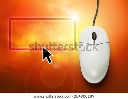 Computer mouse on orange background  in closeup