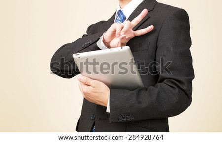 businessman peace sign gesture