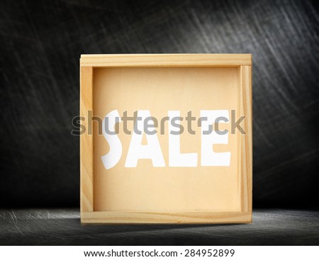 New square wooden frame with sale word