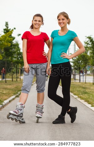 Portrait of two friends ready for exercise.Sporty girls