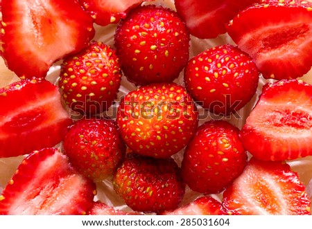 inlaid pattern of ripe red strawberries close up