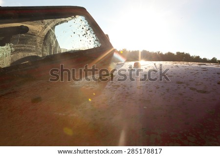 A close up detail view of a muddy off road all terrain vehicle. Royalty-Free Stock Photo #285178817