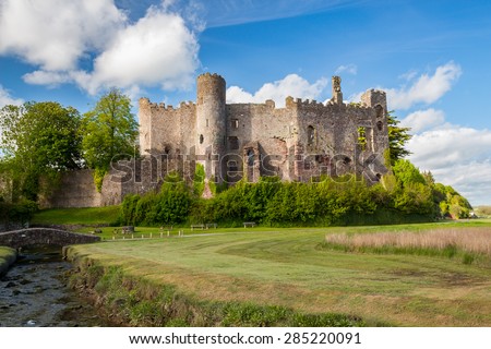 Estuary of the River  with Laugharne Castle  in the background Carmarthenshire, Wales UK Europe