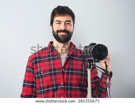 Photographer over textured background