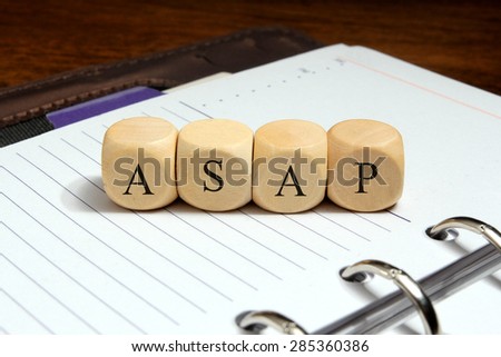 ASAP word concept on notebook