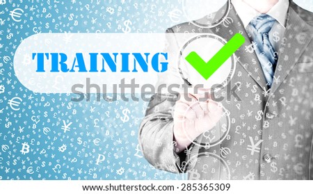 Businessman pressing touch screen interface training checkbox