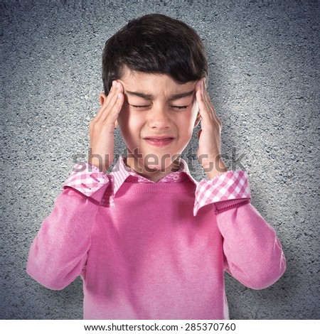 frustrated boy over textured background