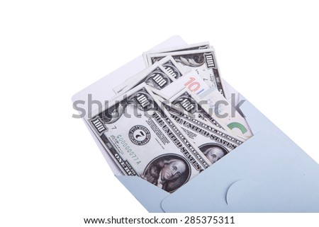 Close up detailed top view of heap of euro and dollar banknotes inside envelope, isolated on white background.