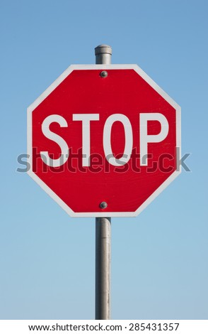 Stop sign and blue sky.