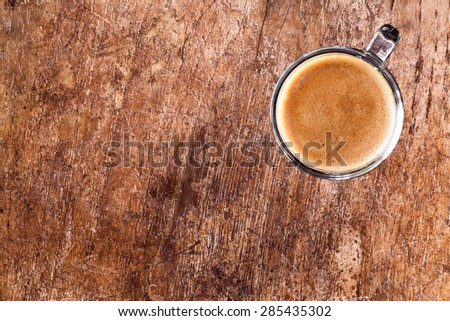 Coffee on old wood wall background.